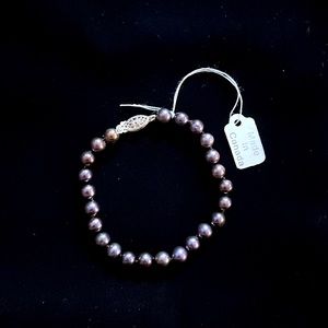 Black cultured freshwater pearl sterling silver line bracelet